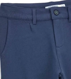 Pantalone con tasconi