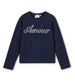 T-shirt blu con perle