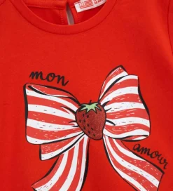 T-shirt con glitter